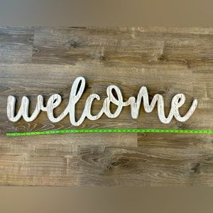 Large “welcome” sign